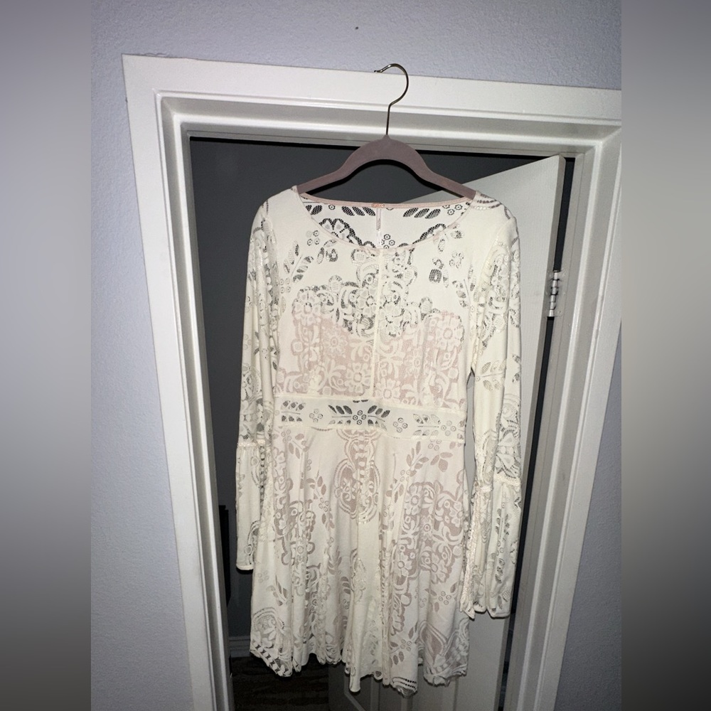 White lace free people dress with bell sleeves
